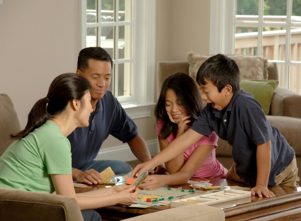 image-asset family playing board game